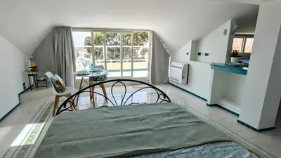 Letto o letti in una camera di Oasis on the Gulf with a Sea View - Unique Roof Top Condo