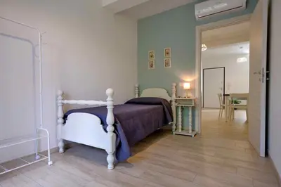 Letto o letti in una camera di Le Magie di Gioba