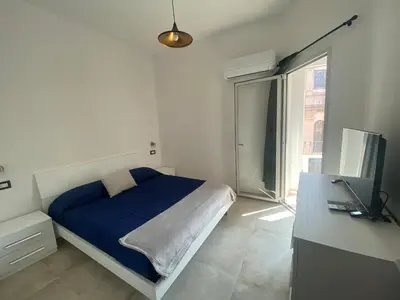 Letto o letti in una camera di Apartment in the historic center
