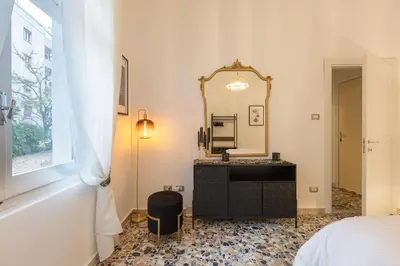 Letto o letti in una camera di CagliariExclusive Parco