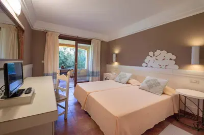 Letto o letti in una camera di Idyllic Lantana resort 2 Bedroom Apartment Sleep 7