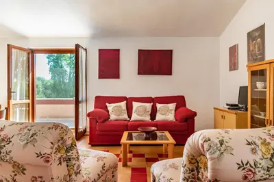 Area soggiorno di Villa Girasole - Petalo Apartment