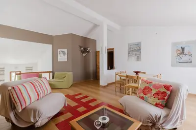 Area soggiorno di Villa Girasole - Petalo Apartment