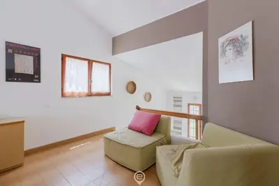 Area soggiorno di Villa Girasole - Petalo Apartment