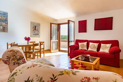 Area soggiorno di Villa Girasole - Petalo Apartment
