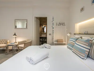 Letto o letti in una camera di Studio 73