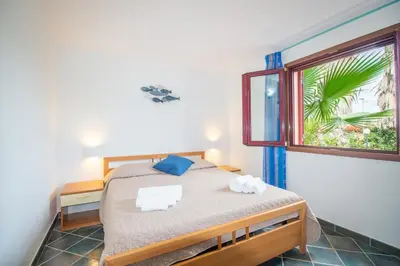 Letto o letti in una camera di Waves Apartment, only 250m from the sea