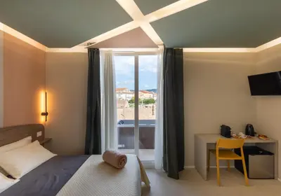 Letto o letti in una camera di Cozy Rooms
