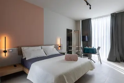Letto o letti in una camera di Cozy Rooms