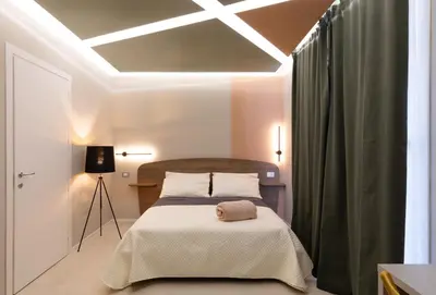 Letto o letti in una camera di Cozy Rooms