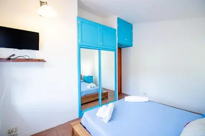 Letto o letti in una camera di S'Omu e Assunta