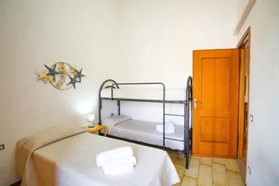Letto o letti in una camera di Alva, only 300m from the sea