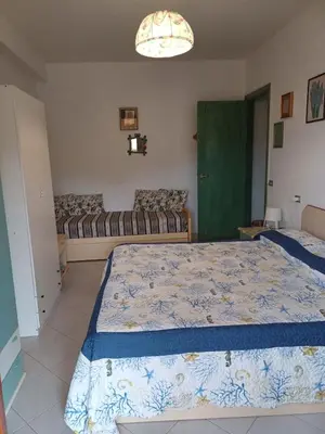 Letto o letti in una camera di Domus Dejanas Villasimius