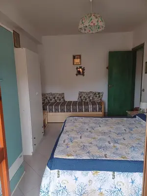 Letto o letti in una camera di Domus Dejanas Villasimius