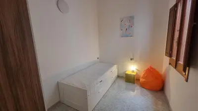 Letto o letti in una camera di Domus Claudia