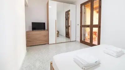 Letto o letti in una camera di Domus Claudia