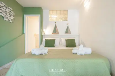 Letto o letti in una camera di Casa Ginepro - Cala Caterina