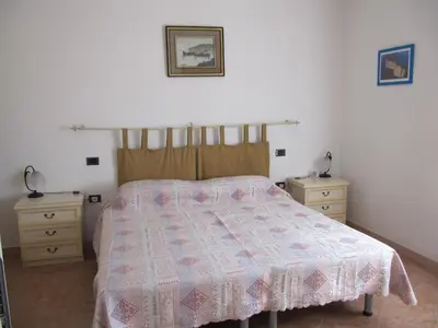 Letto o letti in una camera di Il Portico
