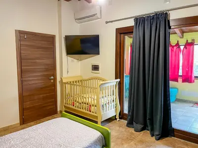 Letto o letti in una camera di Casa Gli Allori