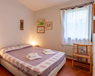 Letto o letti in una camera di Bellavista 23