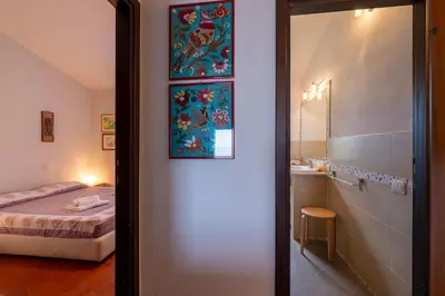Letto o letti in una camera di Bellavista 23