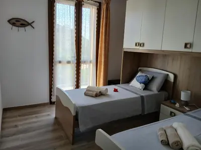 Letto o letti in una camera di Villa con vista mare - Costa Rei