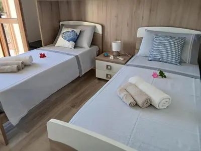 Letto o letti in una camera di Villa con vista mare - Costa Rei
