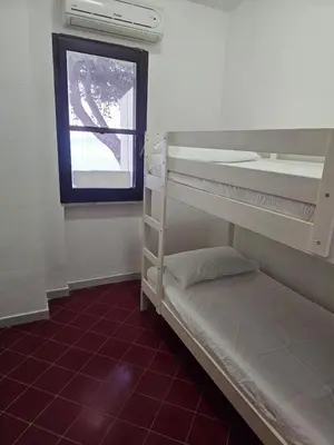 Letto o letti in una camera di LA DOLCE VITA Pinus Village