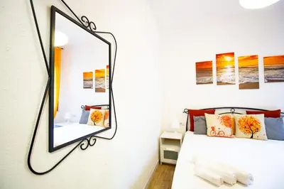 Letto o letti in una camera di S'Arenada B
