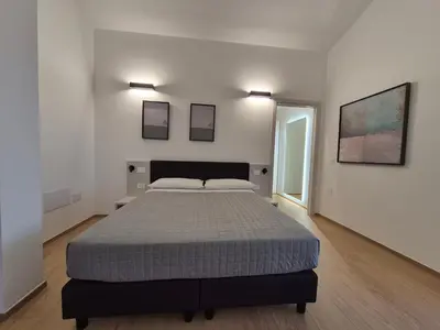 Letto o letti in una camera di Mediterranea Apartments Aurora
