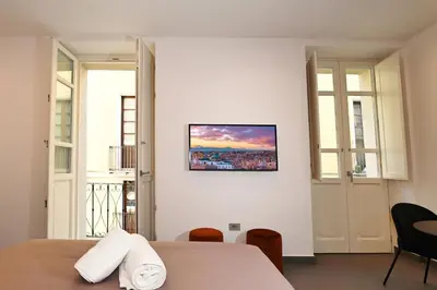 TV o dispositivi per l'intrattenimento presso Rosa Marina rooms