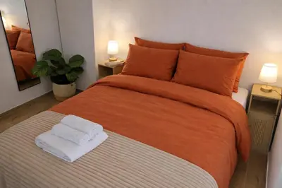 Letto o letti in una camera di Solana Cagliari Apartment