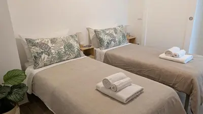 Letto o letti in una camera di Solana Cagliari Apartment
