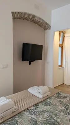 Letto o letti in una camera di Solana Cagliari Apartment