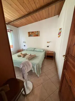 Letto o letti in una camera di VillaOasi