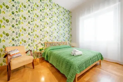 Letto o letti in una camera di Caralis Home- Centro Storico