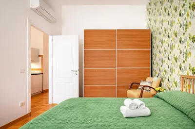 Letto o letti in una camera di Caralis Home- Centro Storico