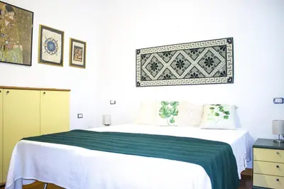 Letto o letti in una camera di S'Omu e Mari