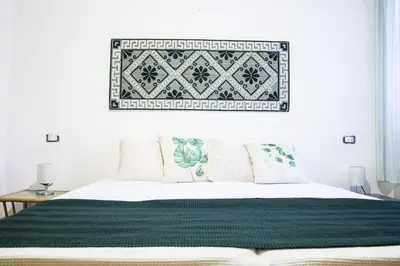 Letto o letti in una camera di S'Omu e Mari