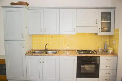Cucina o angolo cottura di Su Moddissi, 250m from the beach