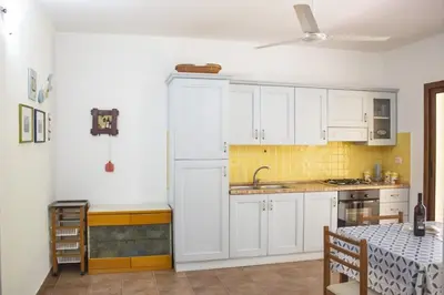 Cucina o angolo cottura di Su Moddissi, 250m from the beach