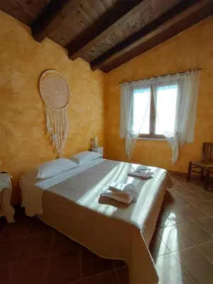 Letto o letti in una camera di Il MoRo Tanca Piras