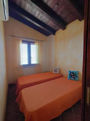 Letto o letti in una camera di Il MoRo Tanca Piras