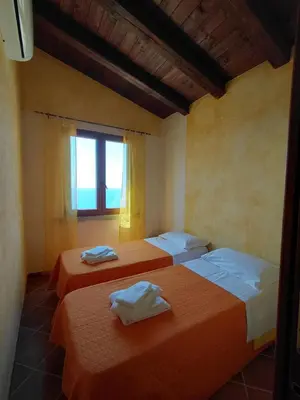 Letto o letti in una camera di Il MoRo Tanca Piras