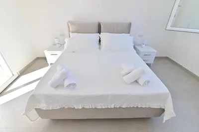 Letto o letti in una camera di Congiu's Apartments