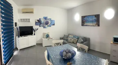 TV o dispositivi per l'intrattenimento presso Villa Ohana
