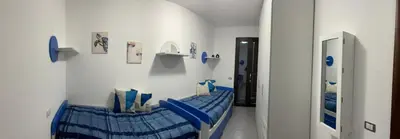 Letto o letti in una camera di Villa Ohana