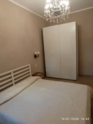 Letto o letti in una camera di Casa Tella