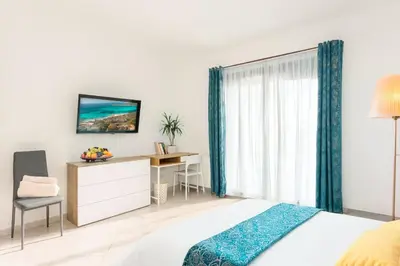 Letto o letti in una camera di Da Iris