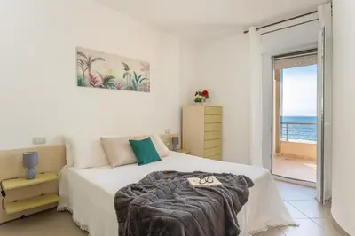 Letto o letti in una camera di Casa Serena - Beautiful sea view with pool